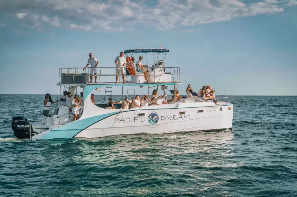 Guests fill both decks of the catamaran during a private charter off Nosara.